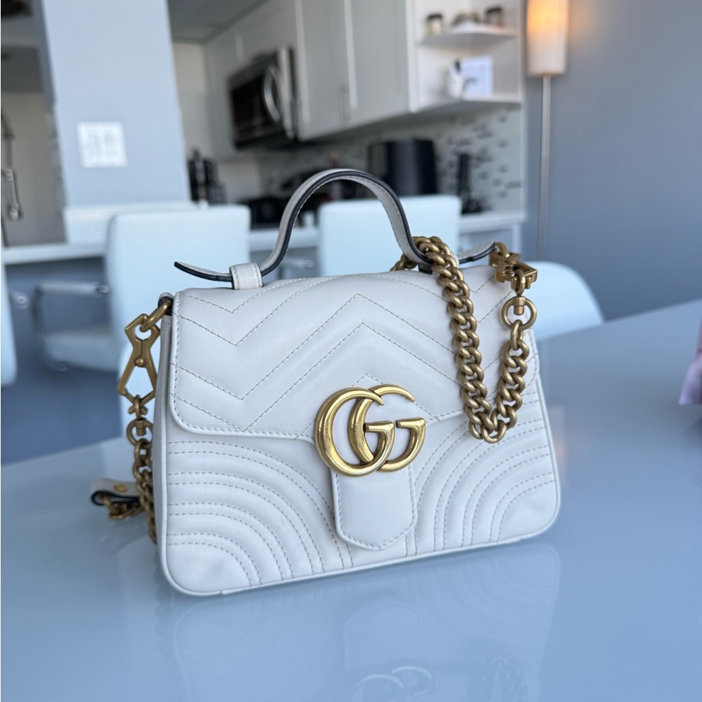 Gucci GG Marmont Matelassé Mini Bag. It features: